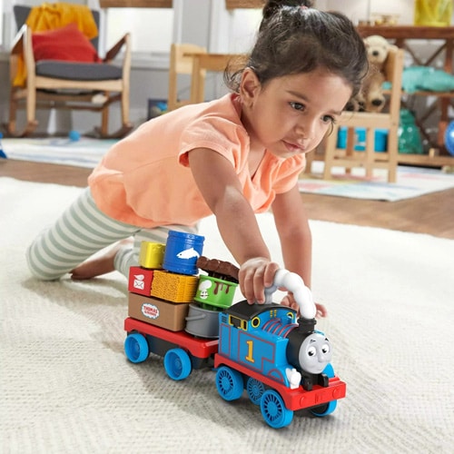 baby pushing a Thomas and Friends – Wobble Cargo Stacker Train