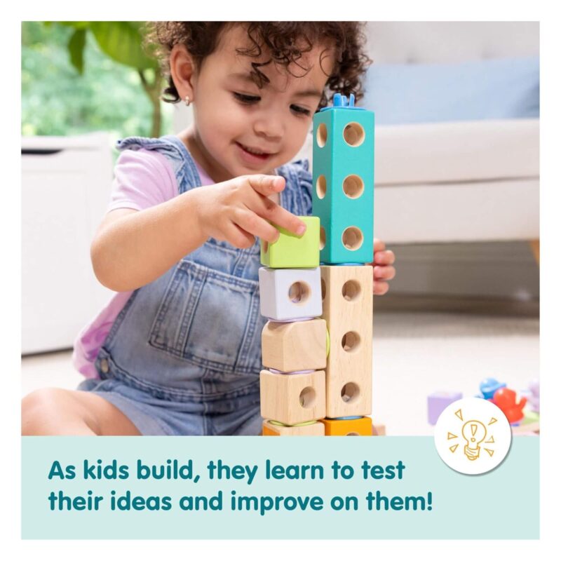 Melissa and Doug - Blockables Town Play Set -lifestyle image a boy is testing his ideas