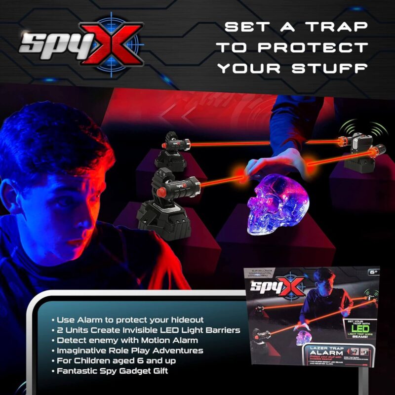 Child using SpyX Laser Trap Alarm toy with LED beams to protect a hideout
