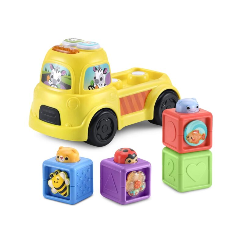 Side view of VTech Baby Pop-a-Block Truck with blocks