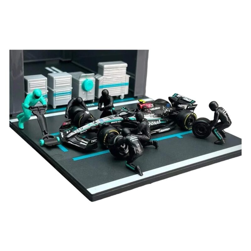 Pit crew action with Mercedes F1 car
