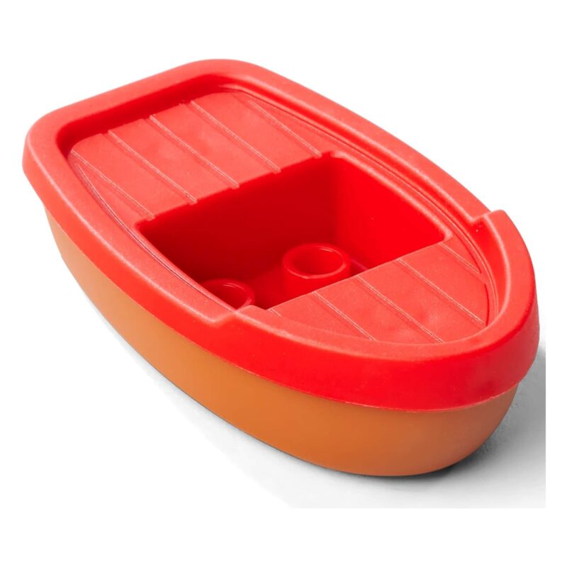 Close-up of the red Aquaplay toy boat