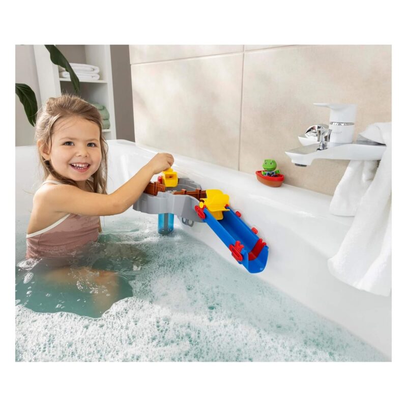 Child activating the Sploshy Mountain paddle wheel