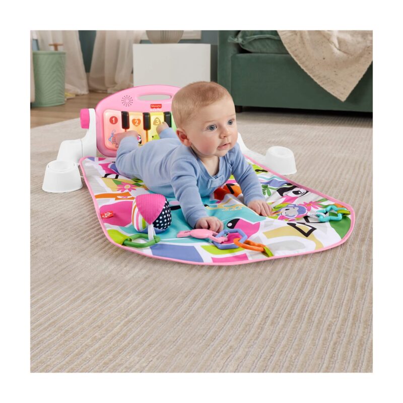 Tummy-time on the colourful Fisher-Price playmat