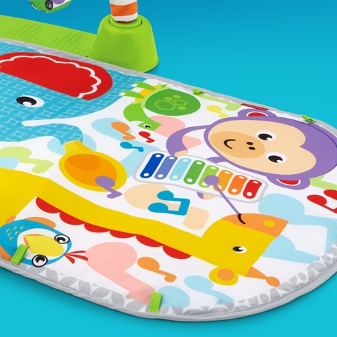 Soft, machine-washable play mat with loops to attach toys